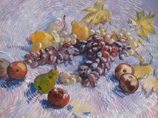 Bunches of purple and green grapes, lemons, pears and apples on a pale tablecloth painted in swirling strokes.