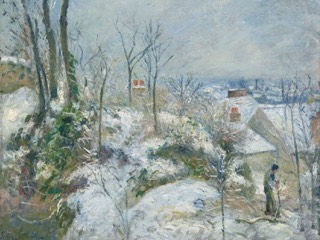 A snowy hillside with bare trees and rooftops, and a man working on a path, on a pale winter day.